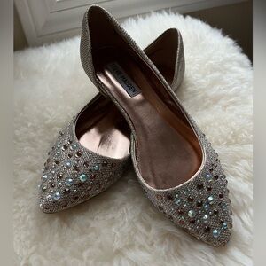 Steve Madden 
Flat woman shoes with rhinestones.